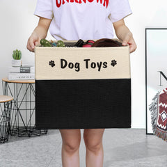 PET ARTIST black dog toy basket folded for compact storage in living room.