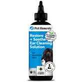 Pet Honesty Restore + Soothe ear cleaner bottle close-up for gentle cleansing.