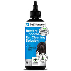 Pet Honesty Restore + Soothe ear cleaner bottle close-up for gentle cleansing.