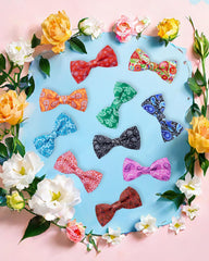 PET SHOW ten-piece paisley bow tie set displayed for variety.