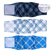 Pet Soft dog belly band in blue plaid worn on a dog for secure, reusable protection.
