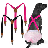 Pet Soft dog suspenders package in black and pink featuring secure diaper-keeper design for all-day diaper security.