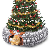 Petrendy Christmas Cat Tunnel Bed under the Christmas tree creates festive shelter and tree protection.
