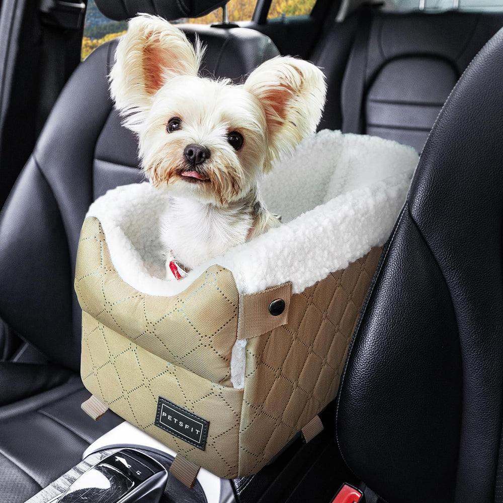 Petsfit center-console dog car seat on armrest showing secure fit for small dogs.