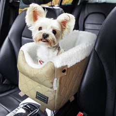 Petsfit center-console dog car seat on armrest showing secure fit for small dogs.