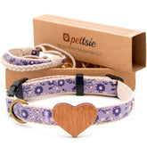 Pettsie dog heart collar with wooden heart detail promotes chic park style and universal fit.