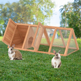Phonjoroo rabbit Hutch outdoors with two doors for easy feeding and cleaning.