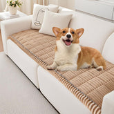 PHOPHO couch cover in plush fabric provides a cozy spot for dogs to relax at home.
