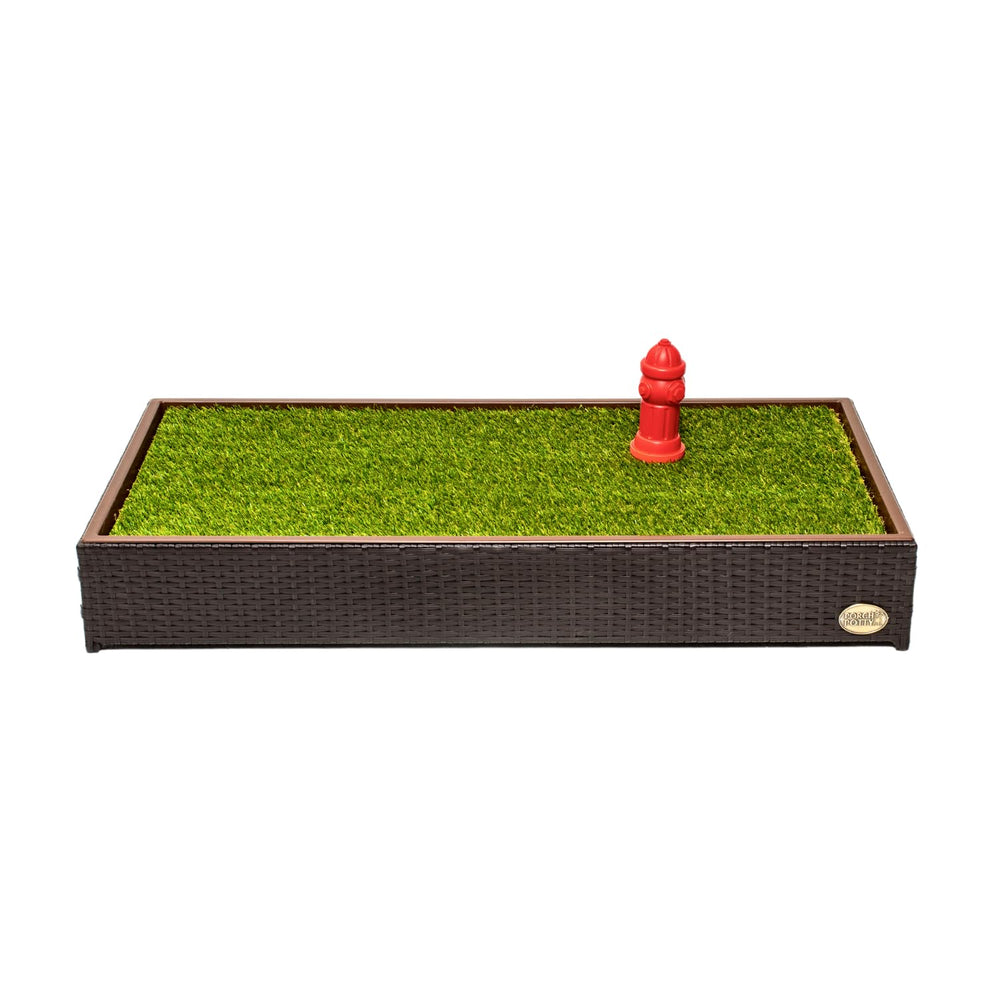 Porch Potty artificial grass with drainage holes for quick cleanups and odor control.