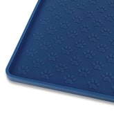 Ptlom pet placemat with anti-slip edge keeps bowls steady during meals.