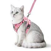 Arnés para gato PUPTECK con malla transpirable y flores rosas para paseos cómodos.