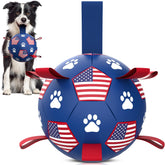 QDAN dog soccer ball with straps ready for outdoor fetch and play.