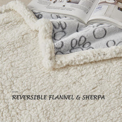 Qeils dog blanket grey-paw-print adds playful style while hiding pet hair.