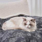 Qeils pet blanket dark-grey top surface provides soft warmth for lounging.