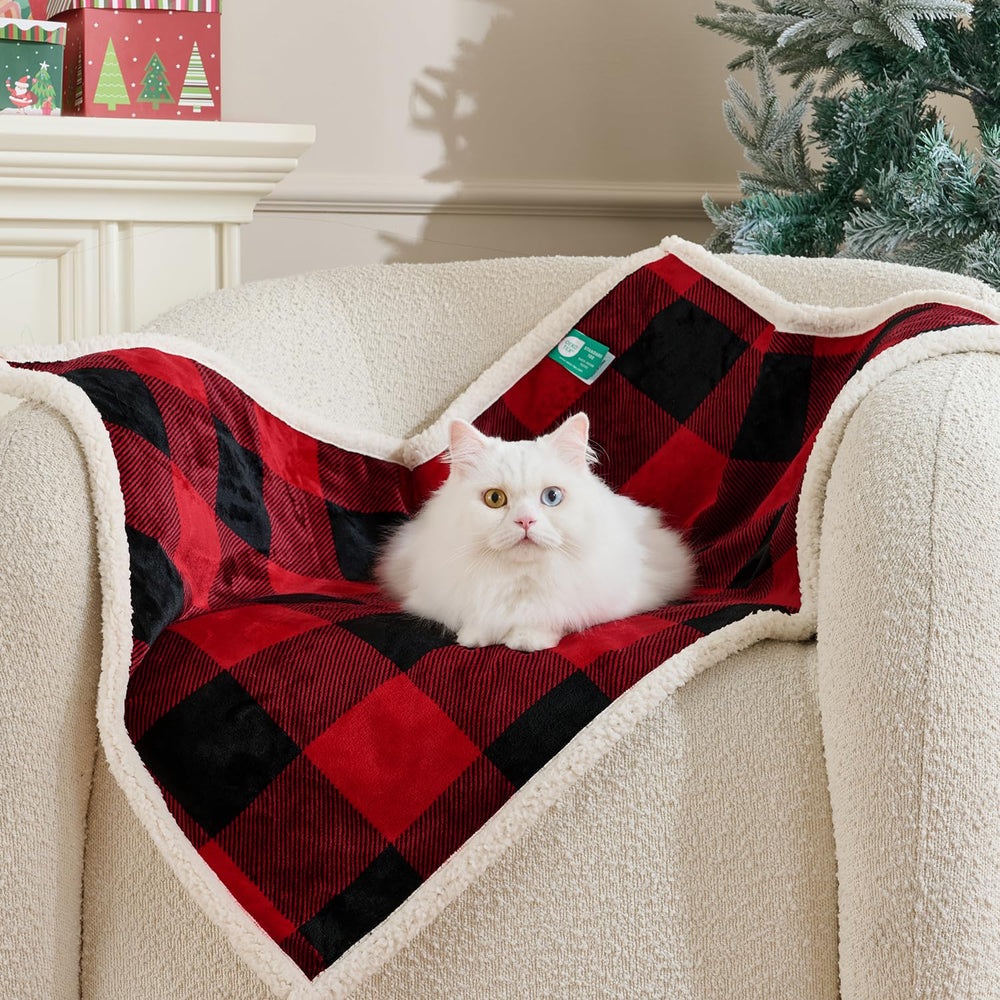 Qeils waterproof pet blanket top layer keeps small pets warm and dry.