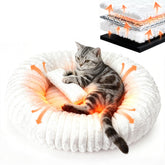 QOKO self-warming cat bed in egg-tart shape provides cozy warmth without electricity.