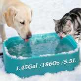 Qvamodo heated water bowl blue exterior shows all-day warmth for outdoor pets.