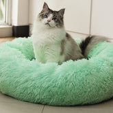 Raimaiso anti-anxiety round fluffy bed 20in light green front view for cozy naps.