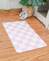 Ralxion checkered dog feeding mat pastel pink provides tidy mealtimes with style.