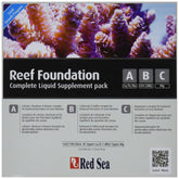 Red Sea Reef Foundation powder bottle demonstrates base-element supplement for coral health.