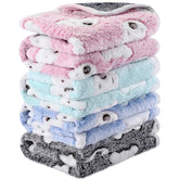 Reginary bear-pattern blanket close-up shows waterproof fleece lining for cages.