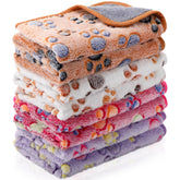 Reginary paw-print guinea pig blanket keeps pets warm and cozy during cuddle time.