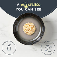 Reveal natural wet cat food chicken-cheese in broth close-up chunk: real protein first.