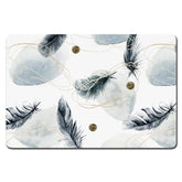 Rnivvi dog food mat with Abstract Plume design absorbs spills at mealtime.