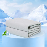 Rywell cooling blanket on sofa provides shared comfort for pet and owner.