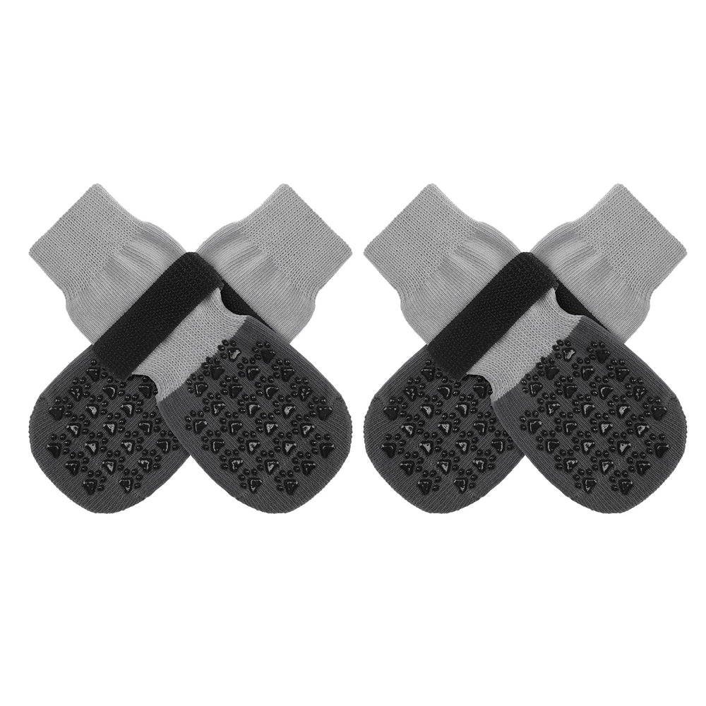 SCENEREAL dog socks with anti-slip grip on hardwood floor for safer stepping.