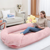 SCNUT Ultra-Soft Dog Bed pink cover close-up emphasizes plush comfort for cozy naps.
