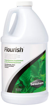 Seachem Flourish bottle cap pour demonstrates easy dosing for aquarium plant nutrition.