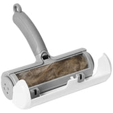 SESAMIU reusable pet hair remover roller on sofa for efficient upholstery fur removal.