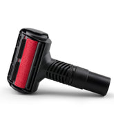 Simplicity Vacuums Pet Fur Remover attachment on couch for quick hair cleanup.