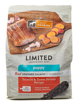 SIMPLY NOURISH puppy salmon-sweet-potato dry dog food bag ready for pantry storage.