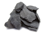 Small World Slate 1-3 inch stones forming aquascaping cliffs for realistic tanks.