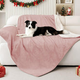 Smiry waterproof dog bed blanket with water-resistant lining protects spills on cozy dusty-pink surface.