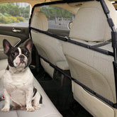 Snagle Paw dog car barrier covering the full backseat for secure road trips.