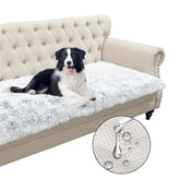 Snugglesinto dogs-cats bed mat in magic gray on sofa offers cozy lounging.