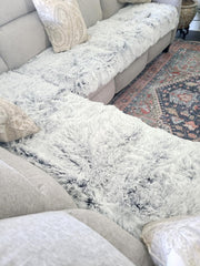 Snugglesinto waterproof inner layer protects furniture from accidents while remaining soft.