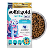 Solid Gold chicken dry puppy food bag closeup showing real chicken first ingredient
