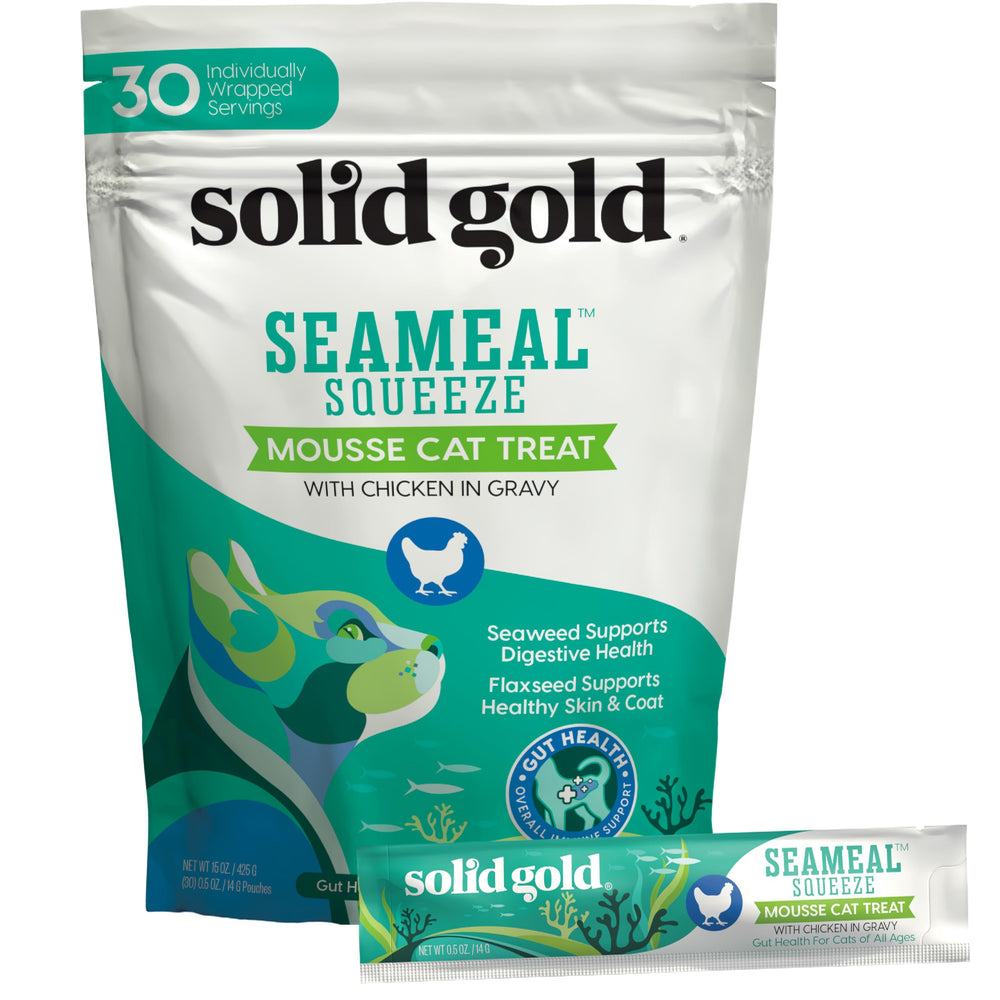 Solid Gold lickable treats tube pour shows creamy texture for convenient cat rewards.