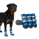 Spark Paws dog shoes blue camo on dog paw showing waterproof protection for outdoor adventures