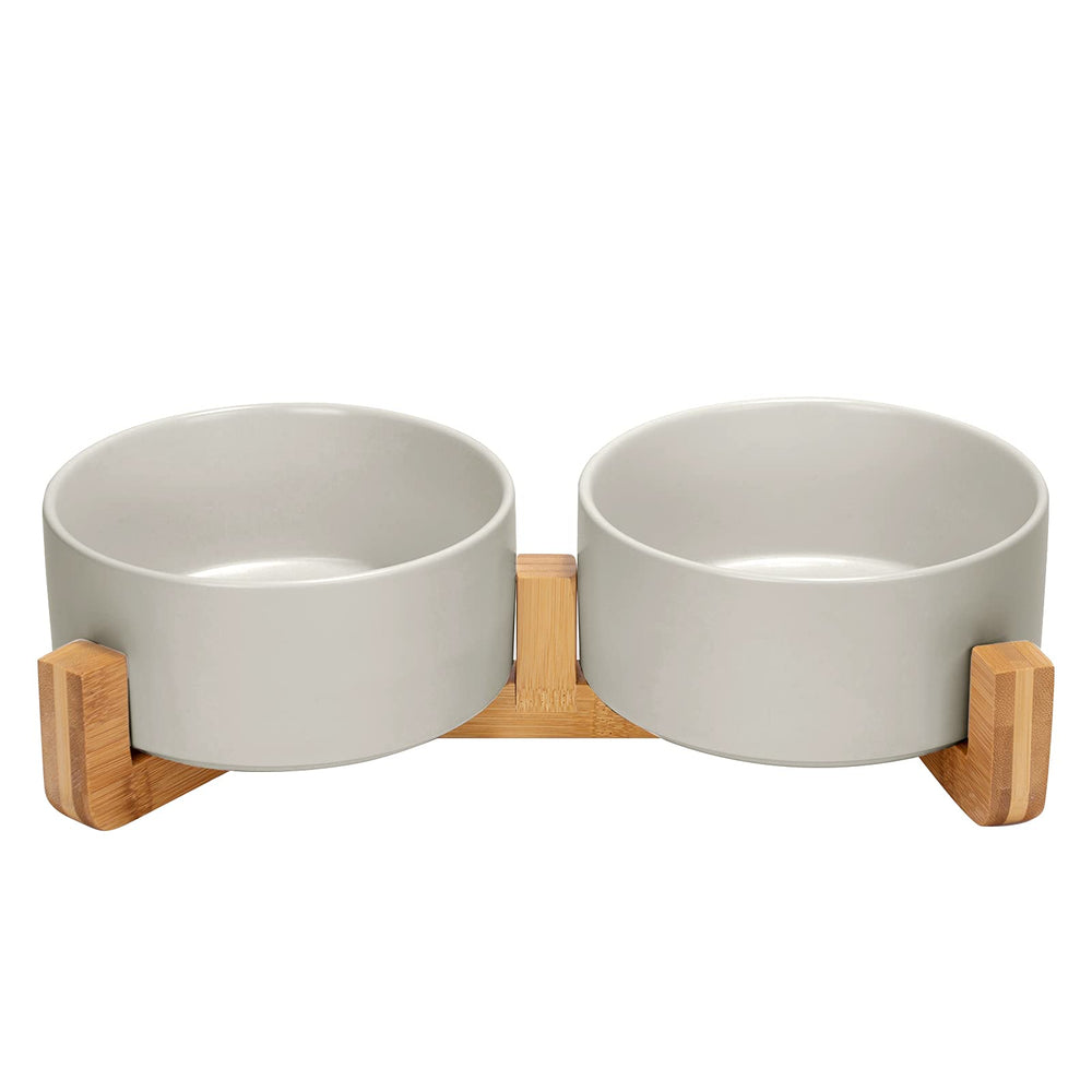 SpunkyJunky ceramic dog bowl on a wood stand improves feeding posture.