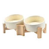 SPUNKYJUNKY tilted bowl beige stand eases feeding for short-nosed pets.