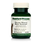 Standard Process Feline Whole Body Support tablet ready to be mixed with cat food.