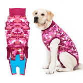 Suitical Recovery Suit pink camouflage worn on dog for post-surgery protection during activity.