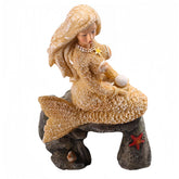 SwandTanpand mermaid statue as a focal point in a small fish tank