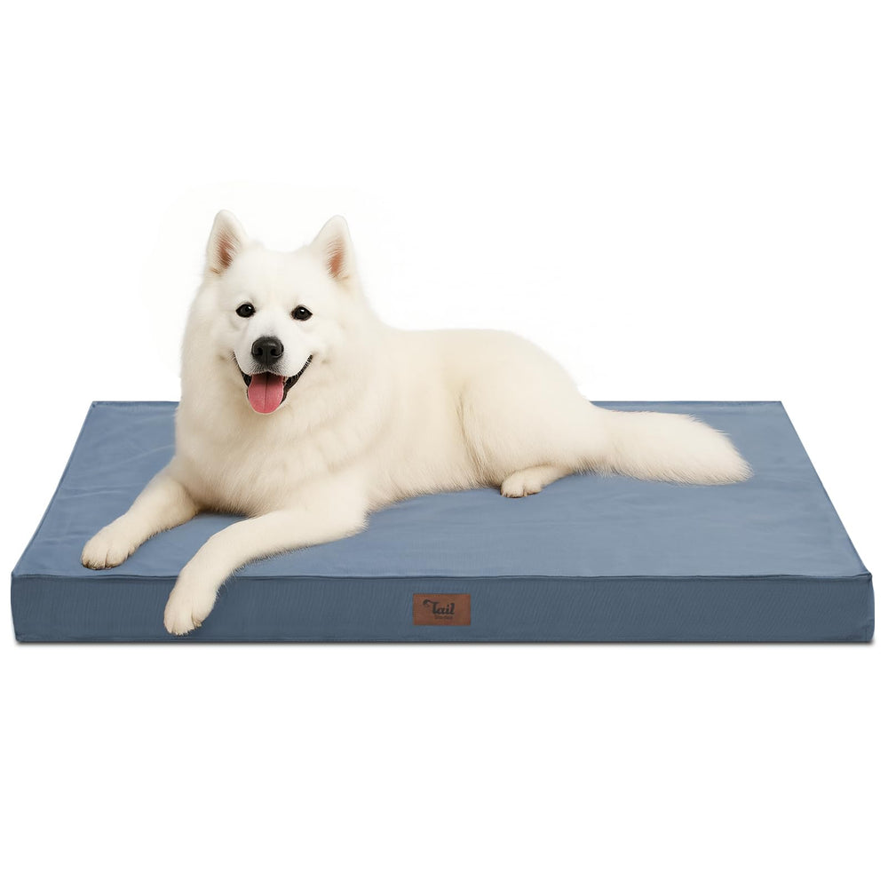 Tail Stories outdoor large washable dog bed with blue cover offering cozy crate rest.