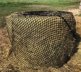 Tech Equestrian haynet over a 4x5 bale reduces waste and promotes steady feeding.